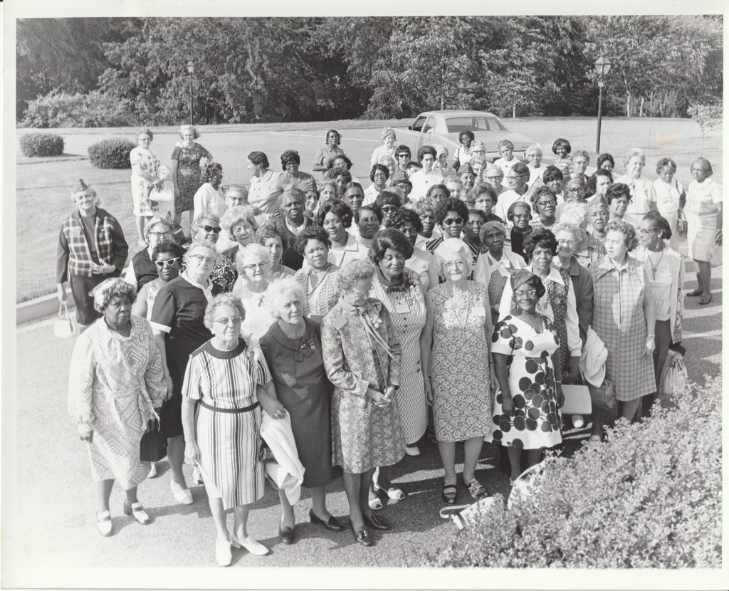 Teacher program participants gathered in front of the Martha Washington building.