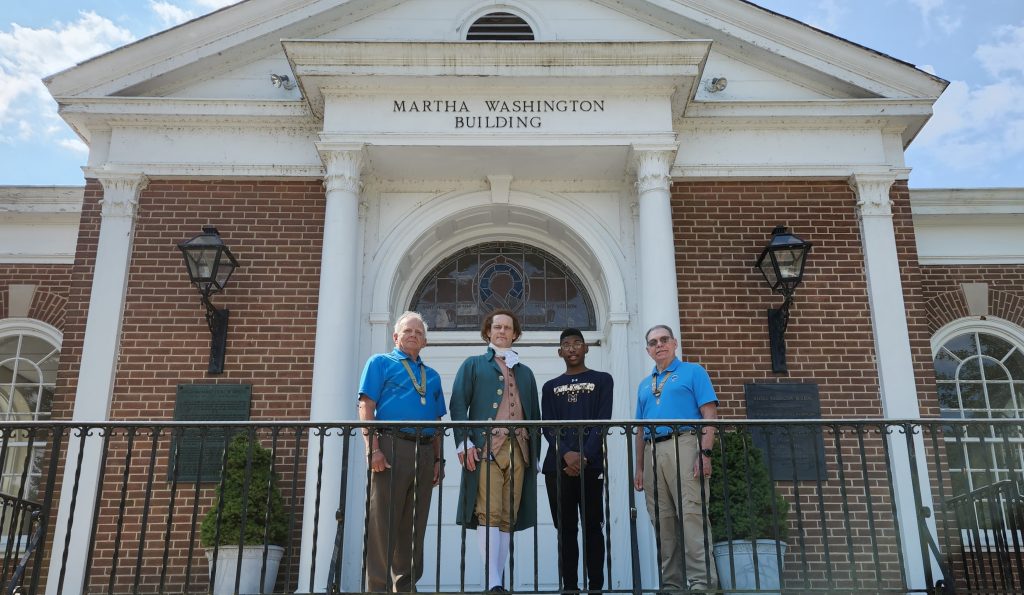 Students and Teachers standing in front of Martha Washington Building