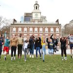 Students picture jumping infront of Indepedence Hall in Philadelphia