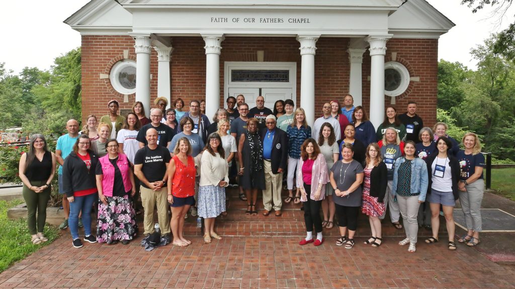 Teachers posing in front of Faith of our Fathers Chapel at Valley Forge